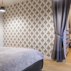 Bedroom with wallpaper